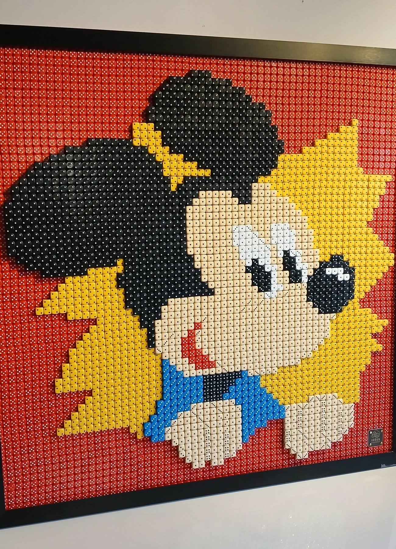 Tableau avec des dés de Mickey